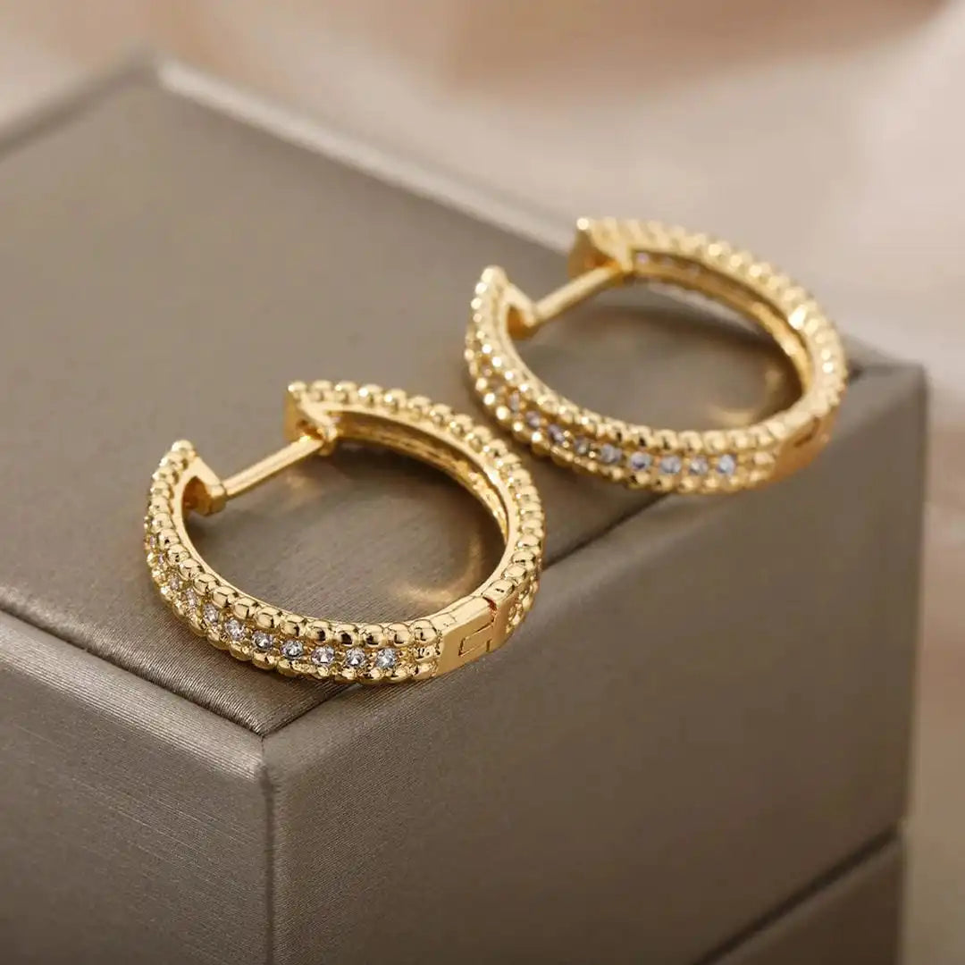 Boucles d'oreilles créoles en cristal clouté