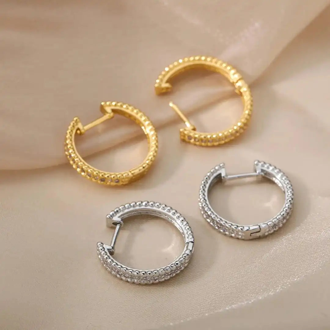 Boucles d'oreilles créoles en cristal clouté