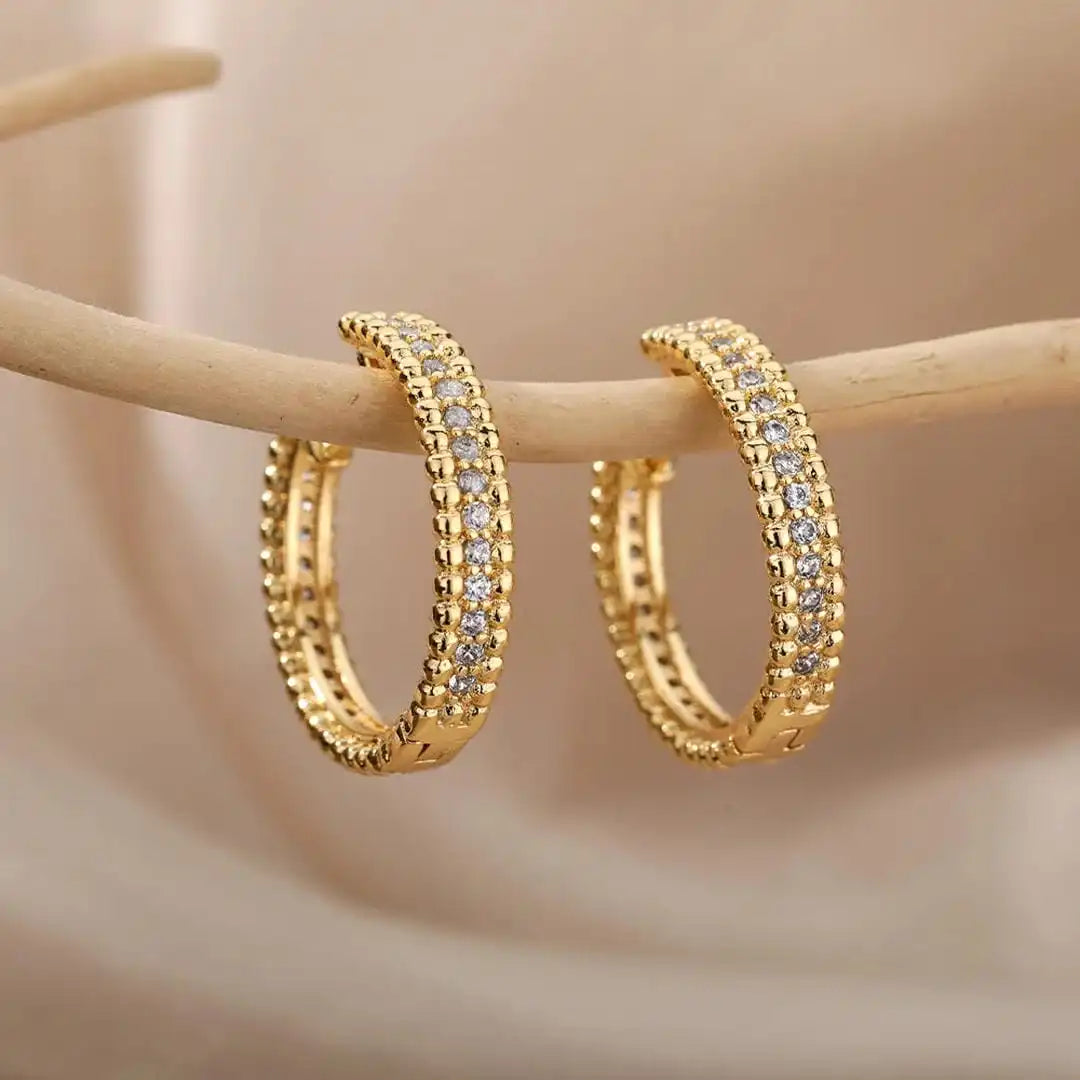 Boucles d'oreilles créoles en cristal clouté