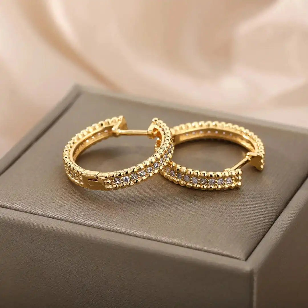 Boucles d'oreilles créoles en cristal clouté