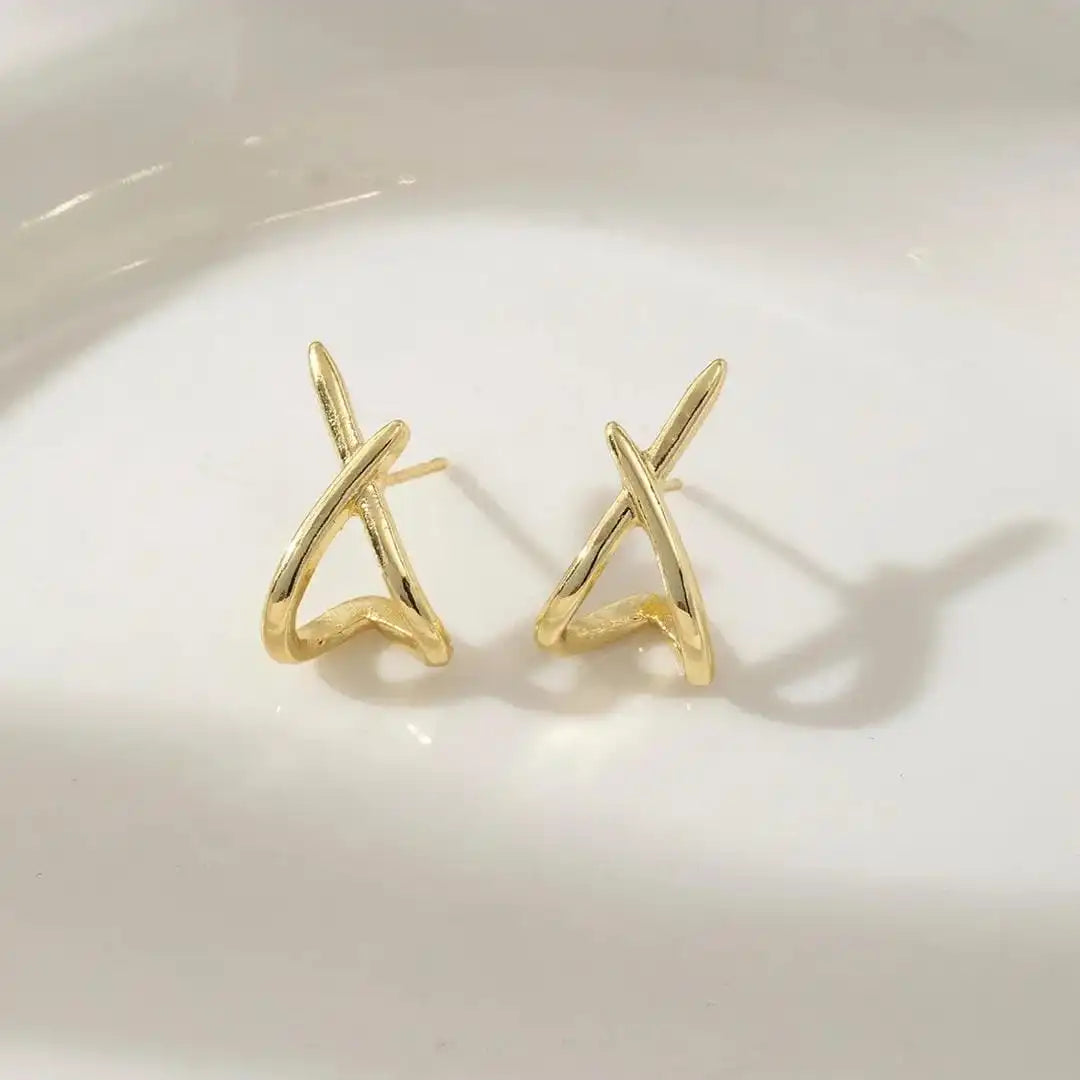 Boucles d'oreilles croisées en or intemporel