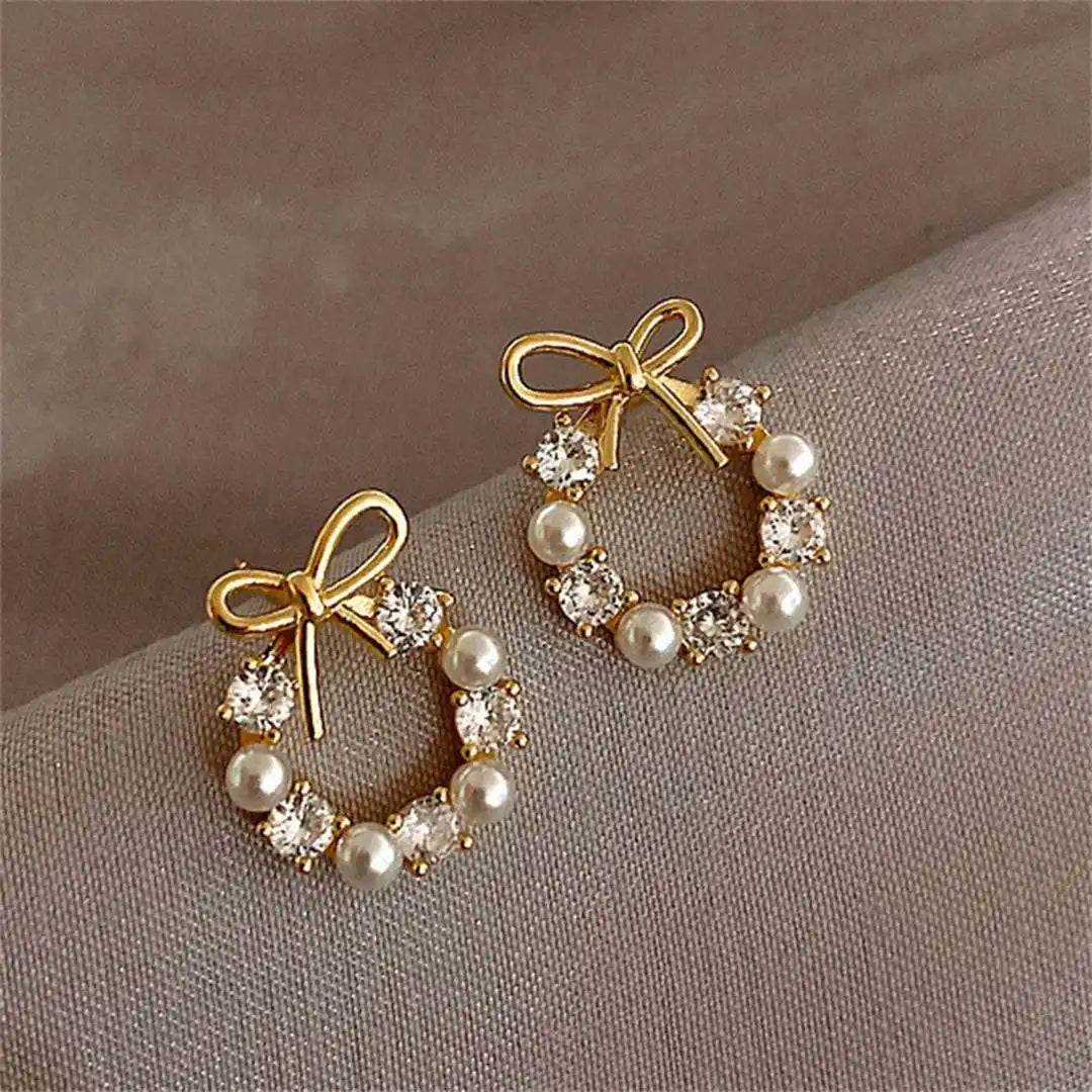 Boucles d'oreilles puces en forme de cercle avec perles et nœud