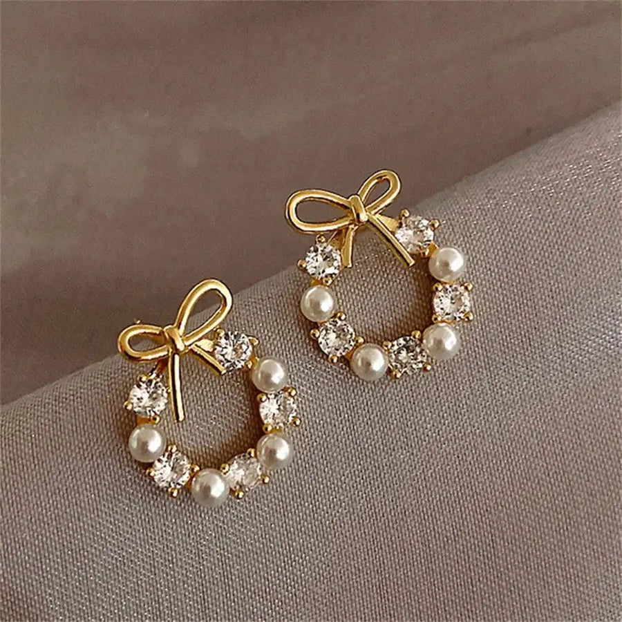 Boucles d'oreilles puces en forme de cercle avec perles et nœud