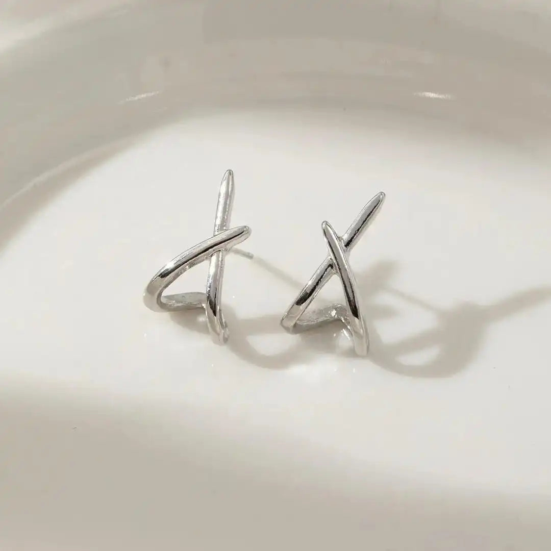 Boucles d'oreilles croisées en or intemporel