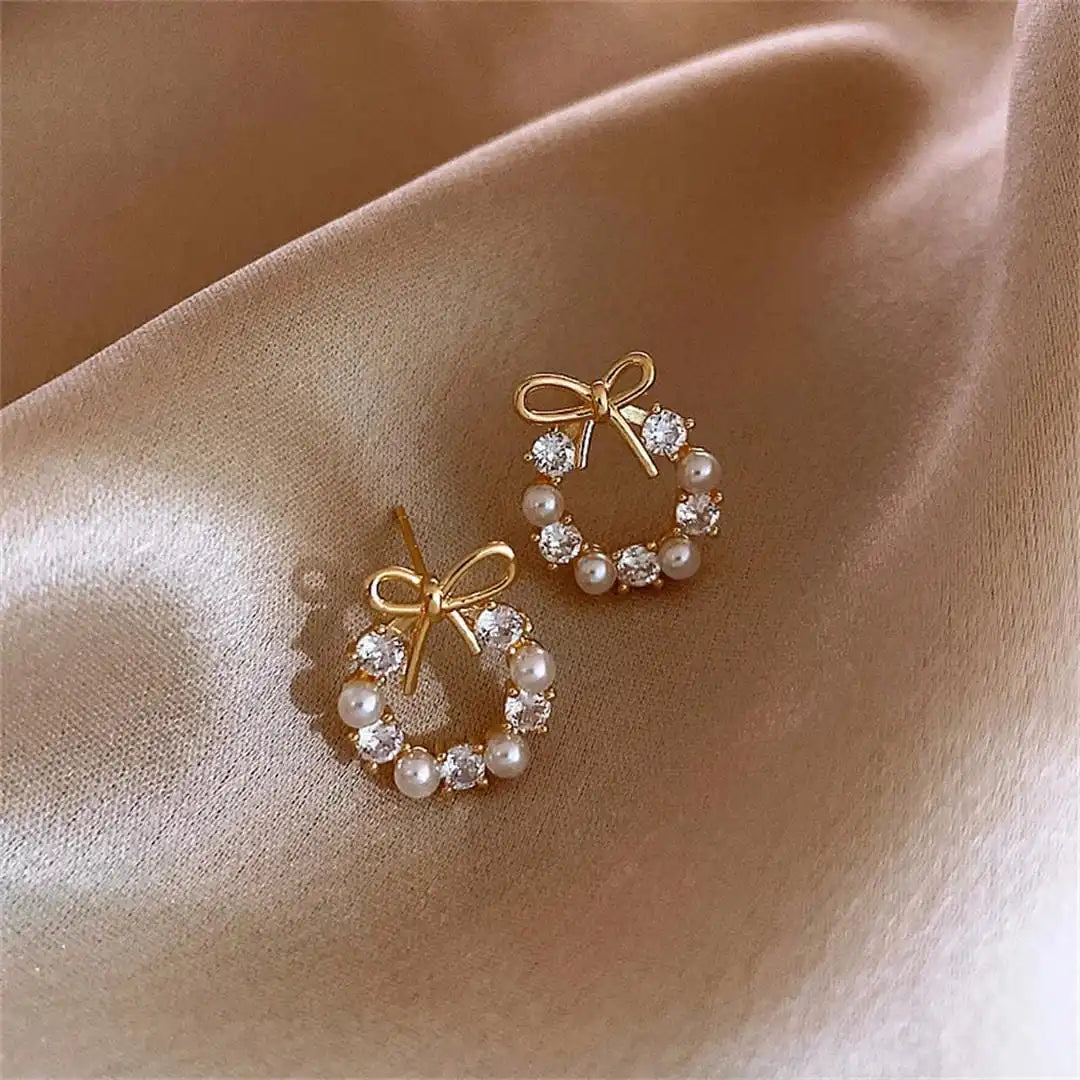 Boucles d'oreilles puces en forme de cercle avec perles et nœud