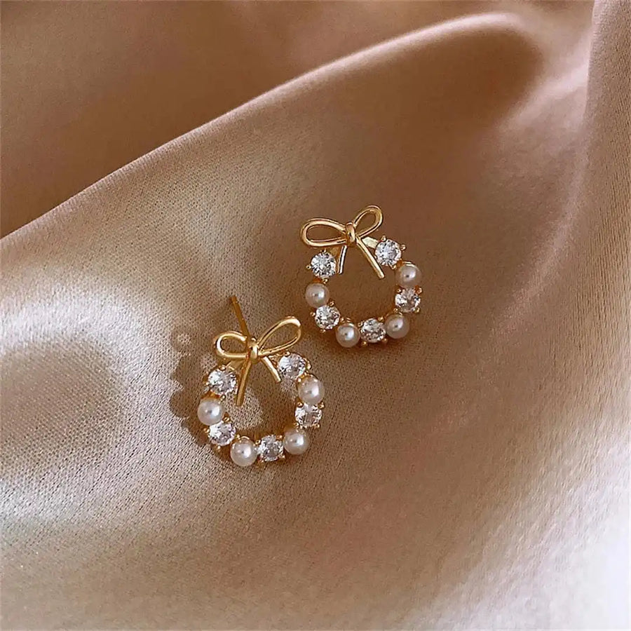 Boucles d'oreilles puces en forme de cercle avec perles et nœud