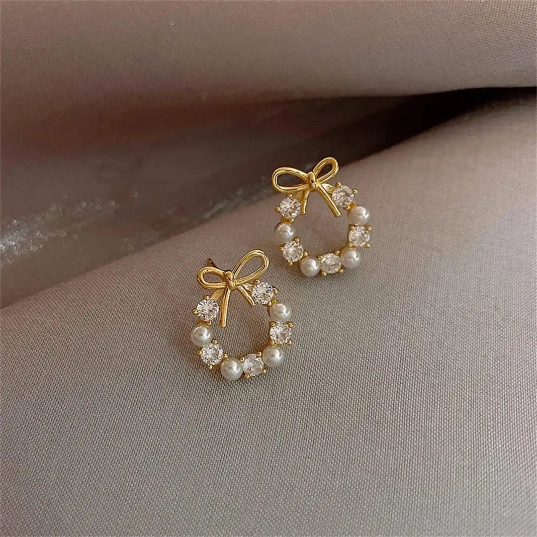 Boucles d'oreilles puces en forme de cercle avec perles et nœud