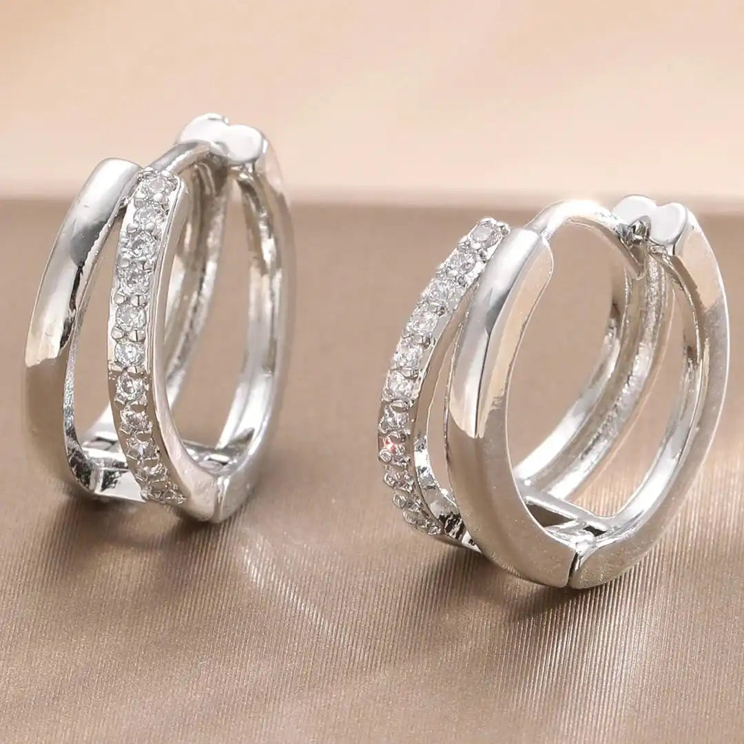 Boucles d'oreilles créoles en zircon doré intemporel