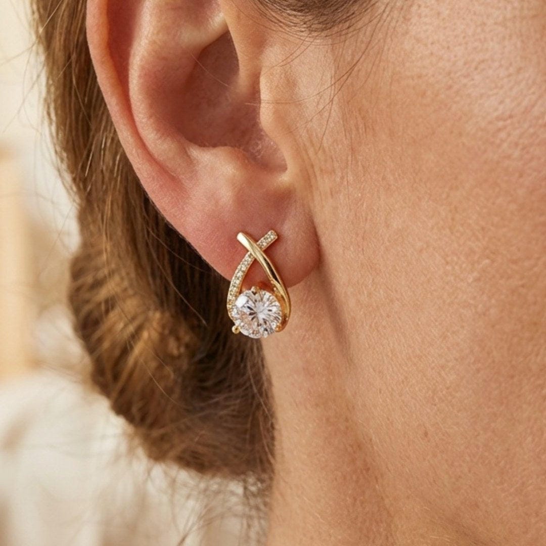 Boucles d'oreilles en cubic en forme de goutte d'eau torsadée de luxe