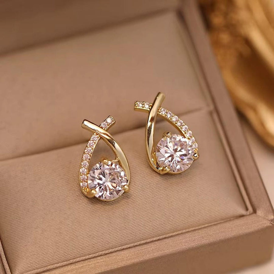 Boucles d'oreilles en cubic en forme de goutte d'eau torsadée de luxe
